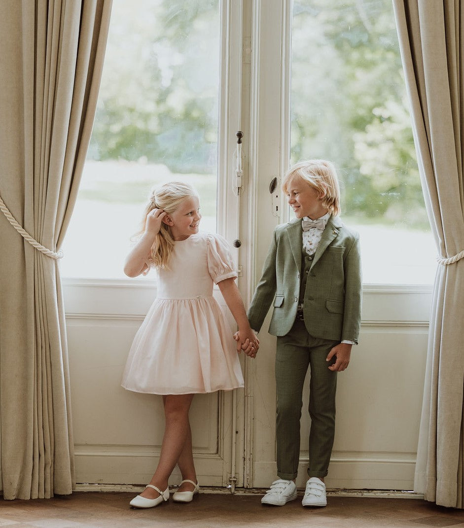 Driedelig groen kostuum