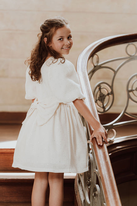 Feestjurk met strik en glitters